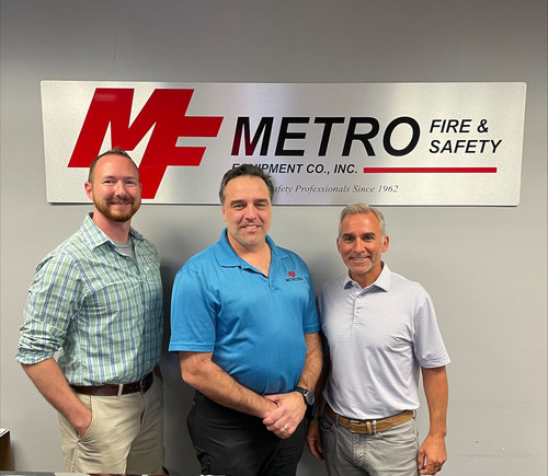 Pye-Barker Fire & Safety's Vice President of Business Development Chuck Reimel meets with Metro Fire & Safety Equipment's Jim Carroll, Jr. and Brian Campbell.